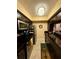 Well-equipped kitchen with dark wood cabinetry, stainless steel appliances, and a functional design at 7138 E Bank Dr # 7138, Tampa, FL 33617