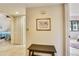Hallway featuring a storage closet and leading to the bedrooms and bathroom at 7564 Bayshore Dr # 207, Treasure Island, FL 33706