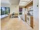 Functional kitchen features stainless steel sink, neutral countertops, and a full appliance package at 7564 Bayshore Dr # 207, Treasure Island, FL 33706