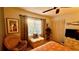 Cozy bedroom featuring a window seat, a large closet, and warm, neutral tones at 1020 Bowsprit Ln # X, Holiday, FL 34691