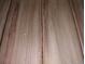 Detailed view of natural wood paneling with distinct grain patterns at 1044 Virginia Dr, Sarasota, FL 34234