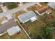 Aerial view of the home showcasing the backyard, neighborhood setting, and privacy fence at 1109 Landau St, Holiday, FL 34690