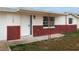 Charming single-story home with red brick accents and a bright, welcoming front entrance at 1109 Landau St, Holiday, FL 34690