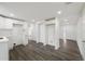 Open kitchen area with modern cabinets, stainless appliances, and light-filled floor plan at 1109 Landau St, Holiday, FL 34690