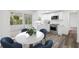 Cozy eat-in kitchen featuring stainless steel appliances and a breakfast nook at 1109 Landau St, Holiday, FL 34690