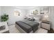 Modern bedroom featuring a comfy bed, wood floors, and bright windows at 1109 Landau St, Holiday, FL 34690
