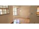 Cozy dining nook bathed in natural light with tile flooring at 11722 Currie Ln # E1, Largo, FL 33774