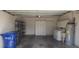 Spacious two car garage with washer, dryer and storage, ideal for projects or parking at 11722 Currie Ln # E1, Largo, FL 33774