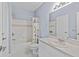 Well-lit bathroom features a shower-tub combination and single sink vanity at 17106 Carrington Park Dr # 622, Tampa, FL 33647