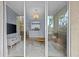 Bright living room with pendant lighting and access to private outdoor patio at 17106 Carrington Park Dr # 622, Tampa, FL 33647
