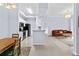 Open concept living space featuring kitchen, living, and dining, with tile floors and ample lighting at 17106 Carrington Park Dr # 622, Tampa, FL 33647