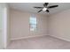 Bright bedroom with carpet, a large window, and a ceiling fan at 2208 Landside Dr, Valrico, FL 33594