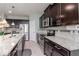 Spacious kitchen with stainless steel appliances, granite countertops, and ample cabinet space at 2208 Landside Dr, Valrico, FL 33594