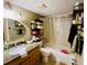 Standard bathroom with a single sink, granite countertop, shower/tub, and towel rack at 2213 65Th N Ave # 2213, St Petersburg, FL 33702