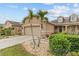 Charming home with well-manicured landscaping, a two-car garage, and a welcoming entrance at 2240 Parrot Fish Dr, Holiday, FL 34691