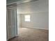 Cozy bedroom with carpeting and a large closet for storage at 2484 Roberta St, Largo, FL 33771