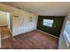 This bedroom has a window, closet space, and carpet flooring at 2484 Roberta St, Largo, FL 33771