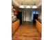Features a spacious layout, wood-look floors, oak cabinets, and stainless steel appliances at 2484 Roberta St, Largo, FL 33771