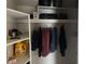 Organized closet with ample storage, shelving, and hanging space for clothes and accessories at 250 Rosery Nw Rd # 288, Largo, FL 33770