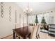 Cozy dining room with stylish decor, natural light, and a view to the outside patio at 2632 Enterprise E Rd # A23, Clearwater, FL 33759