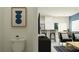 Modern living room featuring a breakfast bar and open floor plan at 32027 Spiceberry St, San Antonio, FL 33576