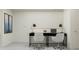 Bright office space featuring two black computer desks and contemporary decor at 32027 Spiceberry St, San Antonio, FL 33576