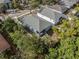 Bird's eye view of a home with a fenced yard and mature trees at 3405 Phillips St, Tampa, FL 33619