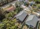 A home showcasing its proximity to neighboring properties in a fenced yard at 3405 Phillips St, Tampa, FL 33619