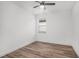 Bedroom with hardwood floors, a ceiling fan, and one window offering natural light at 3405 Phillips St, Tampa, FL 33619