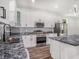 Beautiful kitchen with stainless steel appliances and white cabinets at 3405 Phillips St, Tampa, FL 33619