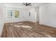 Bright living room features wood-look flooring and recessed lighting at 3405 Phillips St, Tampa, FL 33619