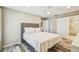 Comfortable bedroom with a large bed, view to the bathroom, and closet at 3462 Sutton Pl, Palm Harbor, FL 34684