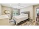 Serene bedroom with a cozy bed and a dresser, offering a relaxing and comfortable space at 3462 Sutton Pl, Palm Harbor, FL 34684