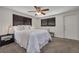 Spacious bedroom with cozy carpet, ceiling fan, two windows and modern decor at 358 51St N Ave, St Petersburg, FL 33703