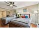 Inviting bedroom showcasing two beds, wood floors, and a calming atmosphere at 36750 Us Highway 19 N # 19308, Palm Harbor, FL 34684