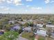 Aerial view of neighborhood featuring tree coverage at 4009 W Mango Ave, Tampa, FL 33616