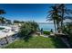 Bayfront property features lush landscaping and direct access to the water for boating and recreation at 4998 62Nd S Ave, St Petersburg, FL 33715
