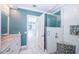 This bathroom features modern fixtures, painted walls, a glass shower, and tile flooring at 4998 62Nd S Ave, St Petersburg, FL 33715
