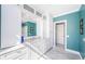 This bathroom offers stylish painted walls, a white countertop, and a large decorative mirror at 4998 62Nd S Ave, St Petersburg, FL 33715
