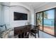 A quaint breakfast nook with ample seating and a stunning water view provides a cozy dining experience at 4998 62Nd S Ave, St Petersburg, FL 33715