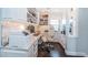 This bright home office offers custom built-ins, granite countertops and ample storage with hardwood floors at 4998 62Nd S Ave, St Petersburg, FL 33715