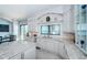 Bright, white kitchen cabinets with marble countertops overlooks the water, providing a picturesque cooking experience at 4998 62Nd S Ave, St Petersburg, FL 33715