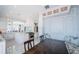 Open-concept kitchen with a large island, stainless steel appliances, and a cozy breakfast nook invites gathering at 4998 62Nd S Ave, St Petersburg, FL 33715