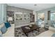 Elegant living room with custom built-ins, plush seating, and stylish rug at 4998 62Nd S Ave, St Petersburg, FL 33715
