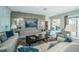 Elegant living room with custom built-ins and comfortable seating arrangement at 4998 62Nd S Ave, St Petersburg, FL 33715