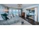Bright main bedroom with water views, access to the deck, and stylish furnishings at 4998 62Nd S Ave, St Petersburg, FL 33715
