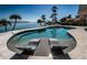 Lounge in-pool or relax poolside and take in the panoramic views of the bay and blue skies at 4998 62Nd S Ave, St Petersburg, FL 33715