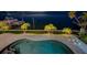 Backyard featuring pool, lush landscaping, and views of the bay and boat dock at 4998 62Nd S Ave, St Petersburg, FL 33715