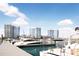 The marina shows multiple yachts docked with high rise buildings in the background at 5120 Marina Way # 21206, Tampa, FL 33611