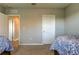 Bedroom featuring twin beds, gray walls, and neutral carpet at 5243 6Th Way N, St Petersburg, FL 33703